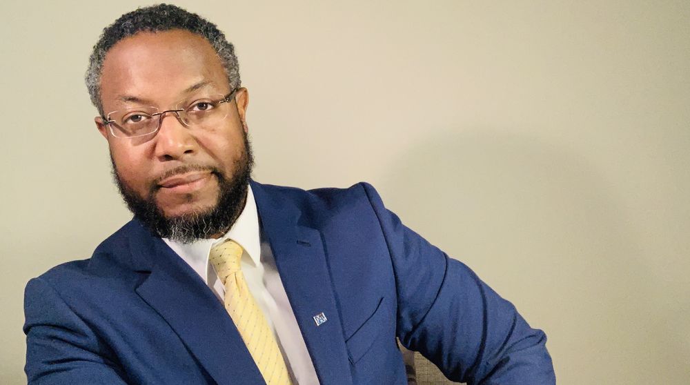 Picture of person holding a business card; visual for Career Plannning Insights service.